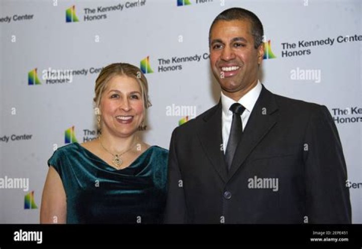 
Ajit Pai And Wife Janine Van Lancker, Who Appointed Him? Robocalls and Reddit Meme 