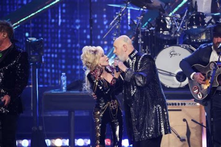 
Why did Dolly Parton pull out of the race to be inducted into the Rock & Roll Hall of Fame? 